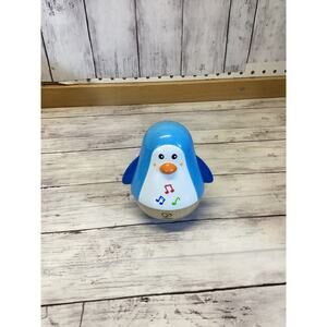 Hape Wooden Musical Penguin Wobbler Toy